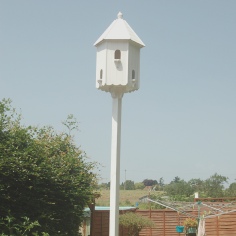six nest dovecote with white roof